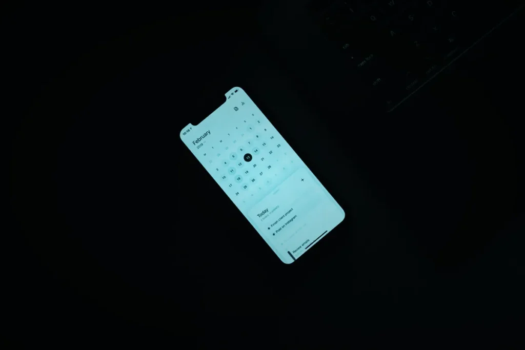 Smartphone on a dark desk